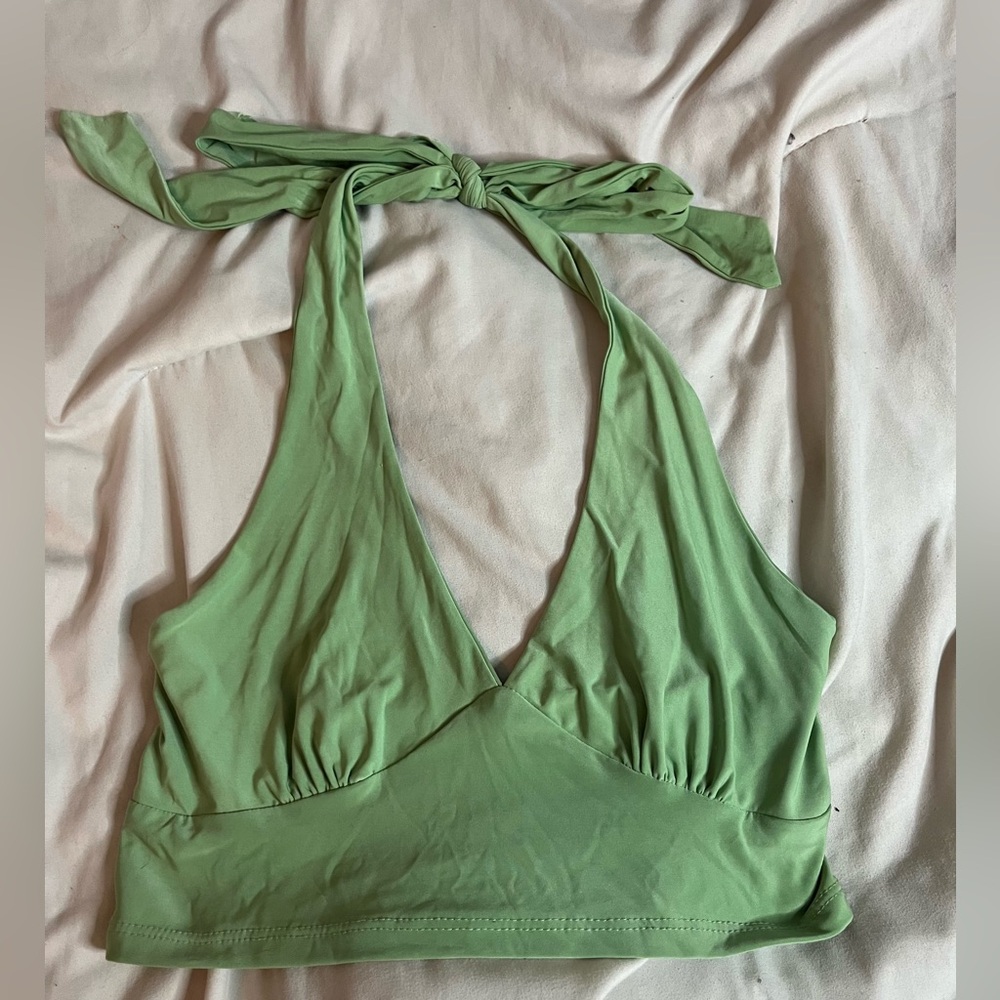 Green halter top with tie around neck. Super cute and soft.